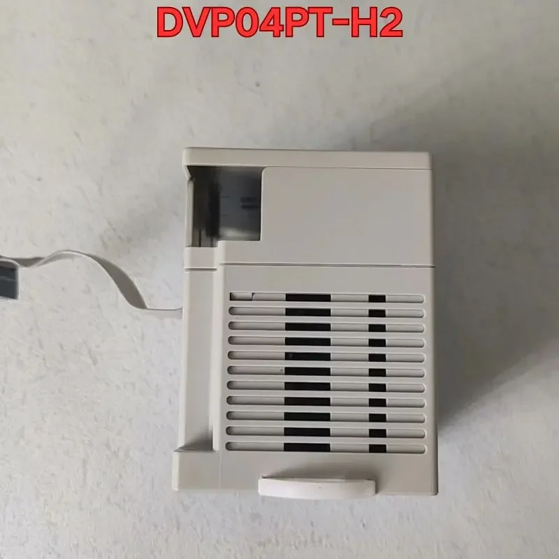 Бывший в употреблении функциональный тест модуля ПЛК DVP04PT-H2 нормально