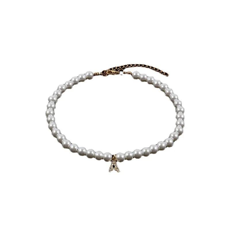 Жемчужное ожерелье с буквами из нержавеющей стали