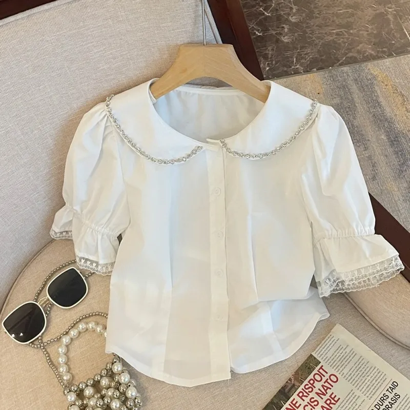 

Diamond Studded Doll Collar Shirt For Women'S Summer 2023 New French Design, Sweet Bubble Sleeves, Age Reducing Temperament, Sho