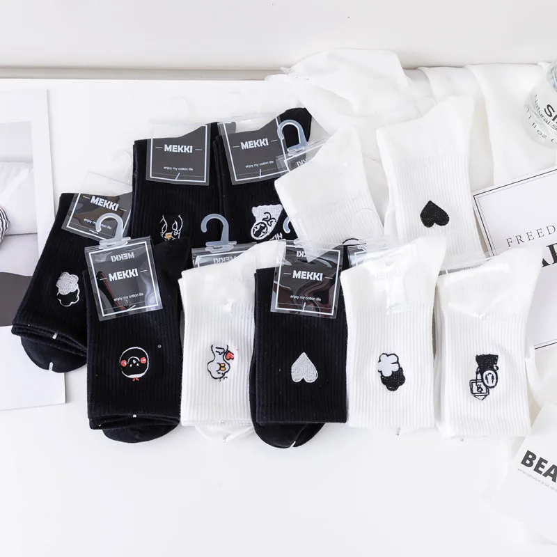 

New Japanese Socks Autumn And Winter Black And White Embroidery Love Faceless Men Combed Women's Medium Tube Socks Cartoon Women
