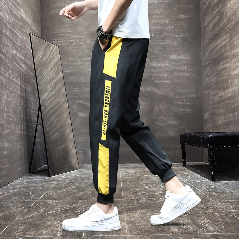 

Весенние новые спортивные брюки мужские модные брендовые свободные мужские брюки для подростков средней школы повседневные спортивные мо...