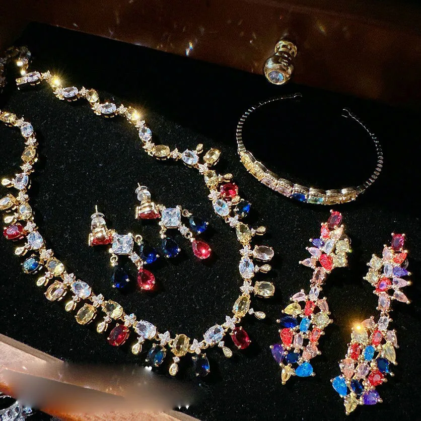 

2023 Women Escaping Princess Rainbow Raindrop Gem Necklace Plated with 18K Gold, Extraordinary Magenta Flower Zircon Earrings