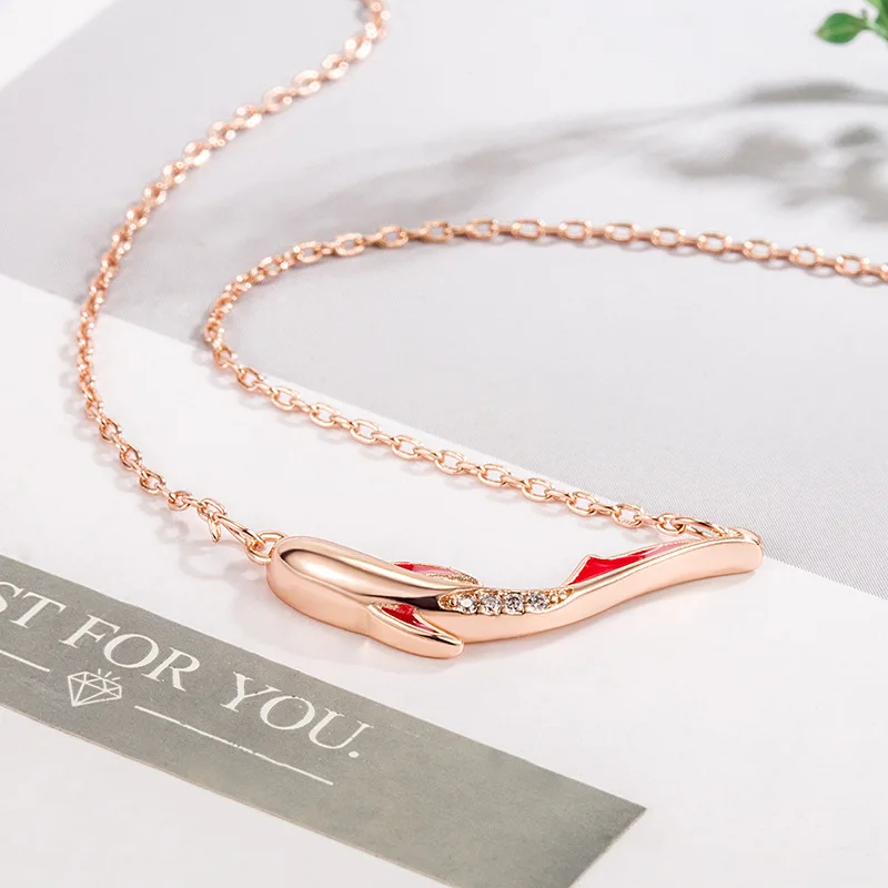 Женское ожерелье с подвеской в виде дельфина из розового золота