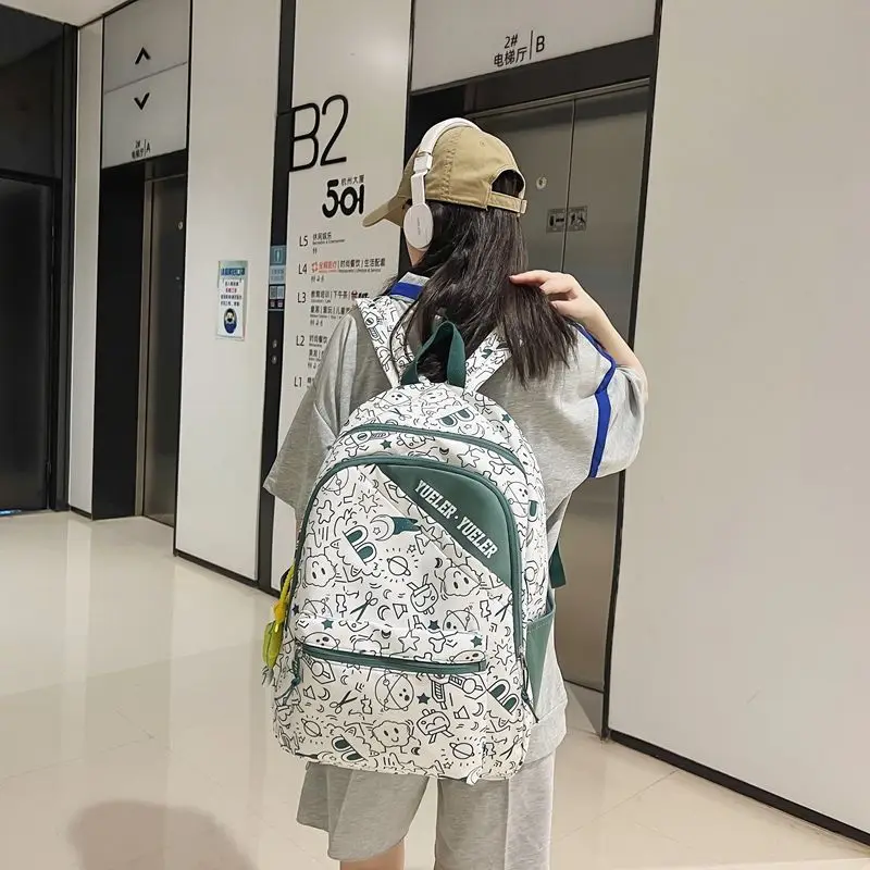 

Women's Students' Popular Schoolbags and Women's Fashion Korea Ins Tide Graffiti Design Backpack Large Capacity Backpack