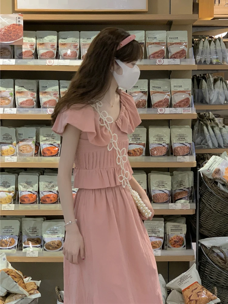 

Женский костюм из двух предметов, элегантный розовый костюм в Корейском стиле, летний топ с летящим рукавом и искусственная кожа, комплект и...