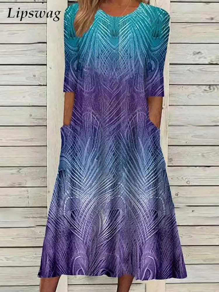 

Платье-миди с круглым вырезом, коротким рукавом и принтом