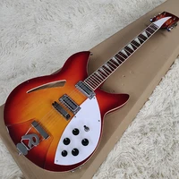 this is a classic electric guitar orange in color made of solid wood with beautiful sound it is free to mail home