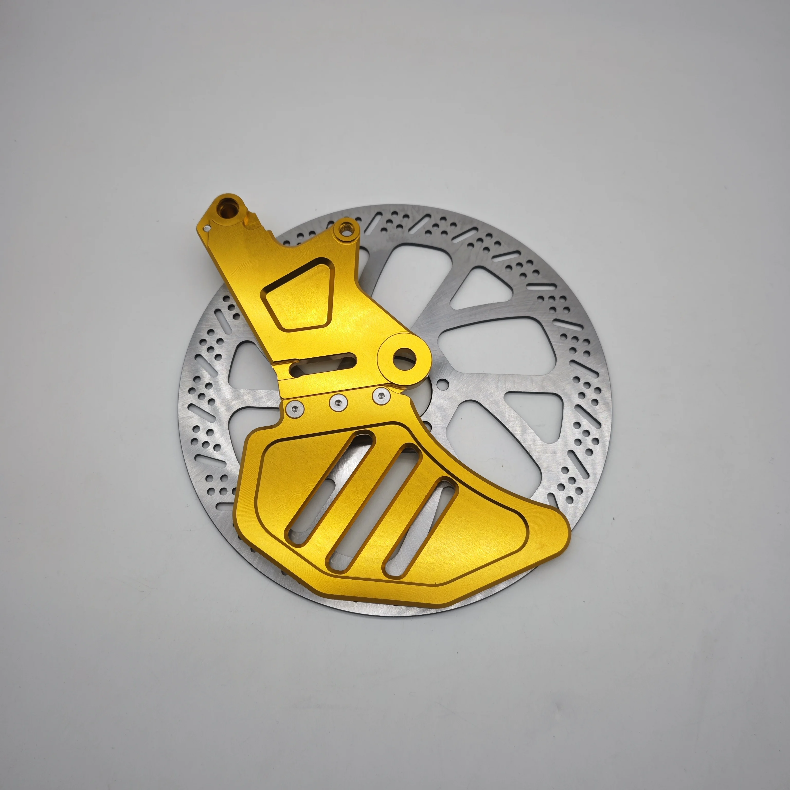 Фото Кронштейн заднего тормоза CNC FMO для крепления диска, усиленная деталь для мотоциклов Ultra Bee Light Bee. №3