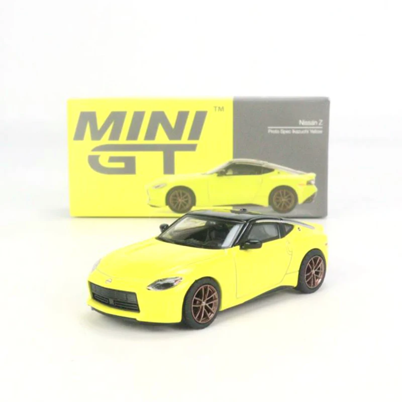 

MINI GT 1:64 Nissan Z Proto Spec 2023 Ikazuchi Yellow MGT00415-CH LHD Car Model Boy Toy Model