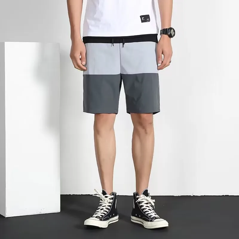 Men's shorts summer new color matching casual sports five-point pants men's loose pants men's jogging shorts