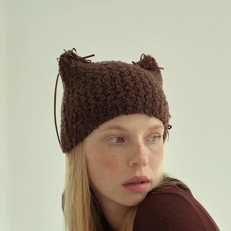 Шерстяная шапка с кошачьими ушками и бантом вязаная ручной работы зимняя