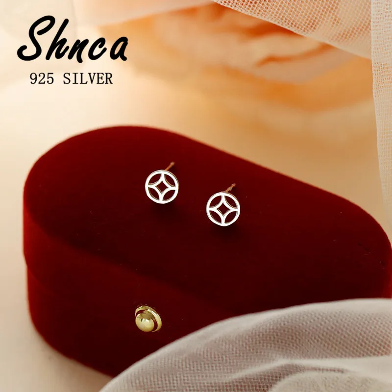 Женские серьги-гвоздики в форме монеты