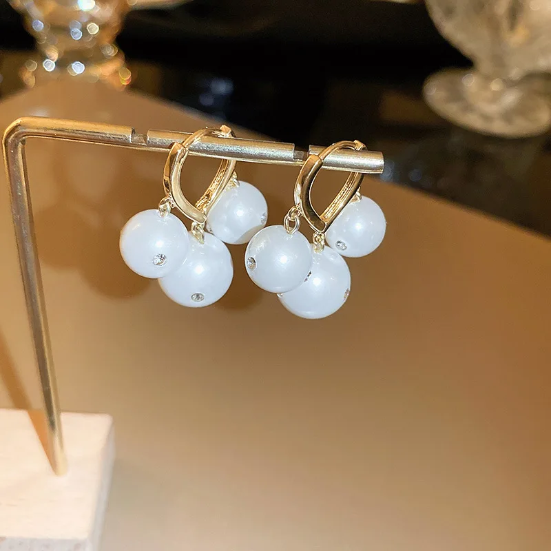 

Женские серьги-подвески с искусственным жемчугом