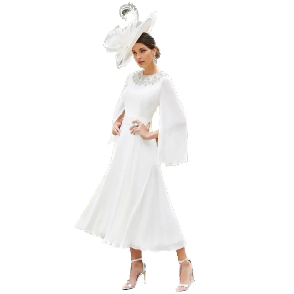 

Chic White Midi Dress with Embellished Neckline Dramatic Bell Sleeves and a Fluid A-Line Skirt Special Events or Garden Parties