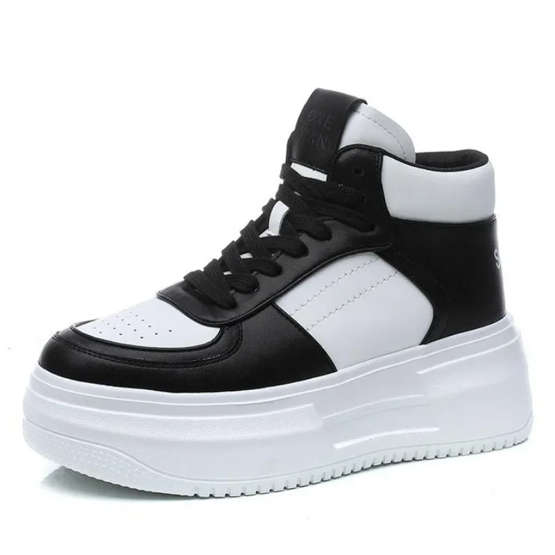 Женские кроссовки из натуральной кожи на танкетке 6 см