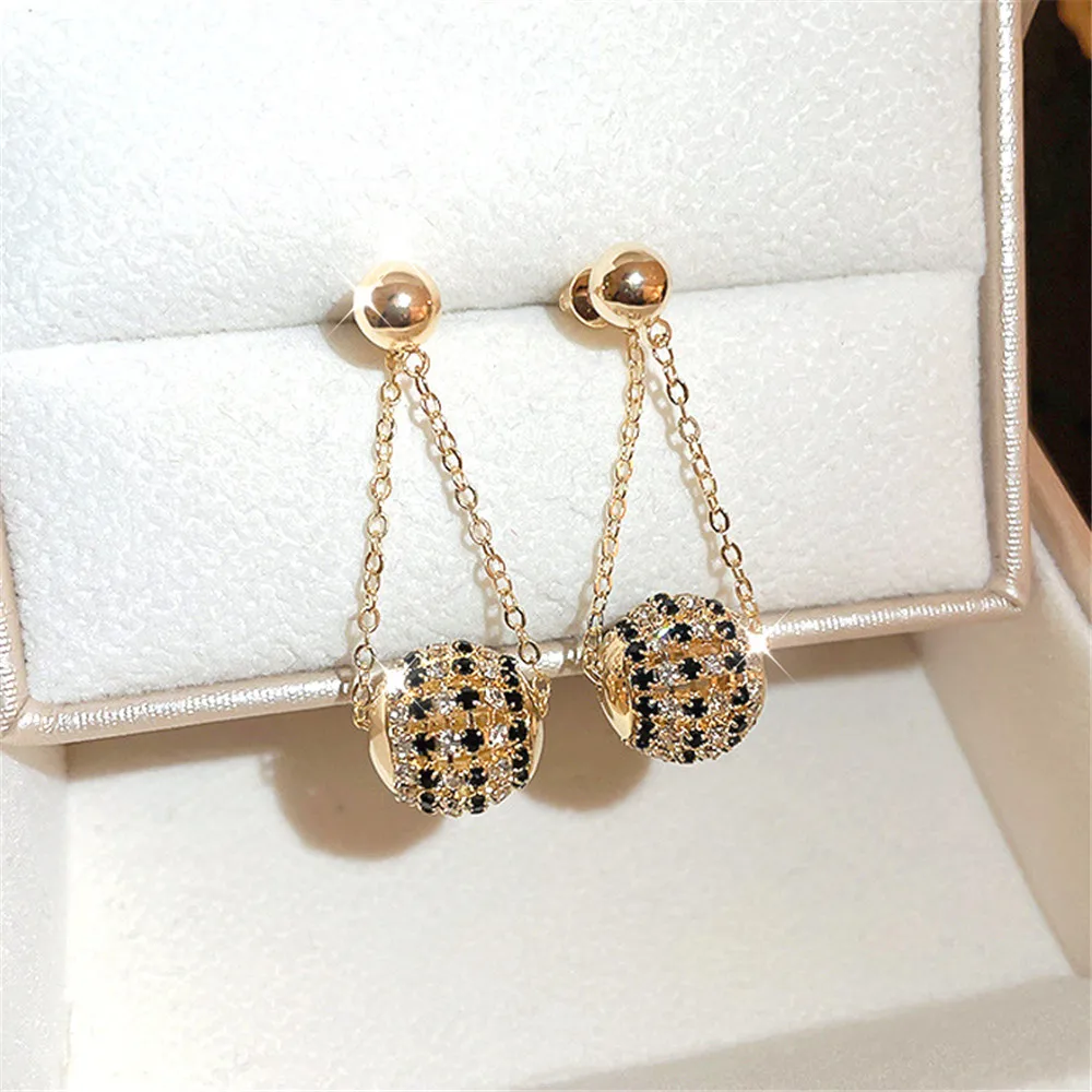

Серьги-кисточки женские из серебра 18 К с инкрустацией из фианита