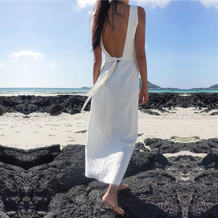 

New 2022 Summer Korean Sexy Backless Beach Holiday Dress For Women Bohemian Spaghetti Strap Cotton And Linen Long Belted Dress
