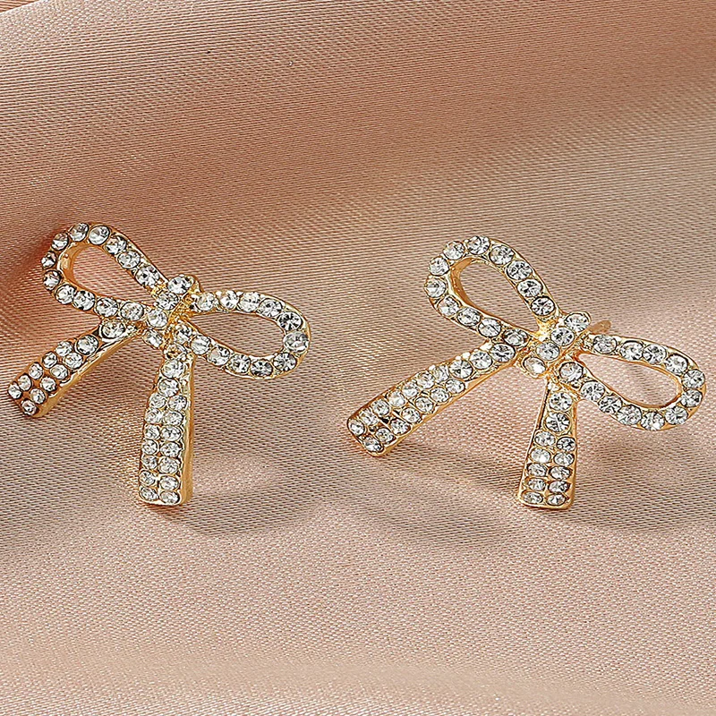 

Delicate Silver Plated Bow Tie Cubic Zirconia Inlaid Earrings Crystal Geometric Bow Knot Shape Stud Earrings Women Fashion Korea