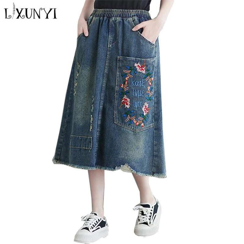 

LXUNYI Summer New Elastic Waist Denim Embroidered Skirt Vintage National Pocket Design Ripped Casual Tassel Long Skirts Women