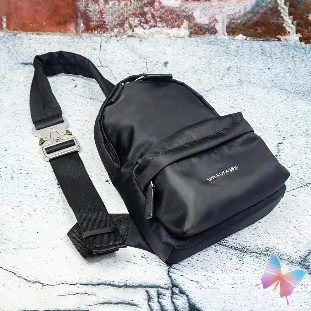 Рюкзак унисекс нейлоновый на молнии с металлическим гнездом и надписью