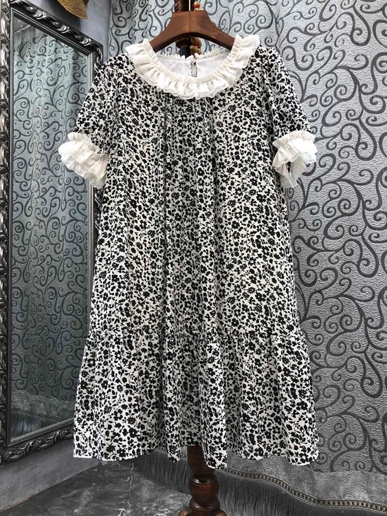 

2022 new women fashion short-sleeved leader mouth color-blocked fungus trimmed floral short-sleeved lotus leaf hem dress 420