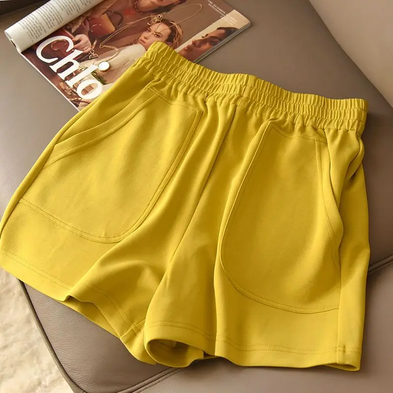 Summer New Elastic Waist Loose Wide Leg Shorts Solid Color Pockets Patchwork Hot Pants Simplicity Casual Women Clothing