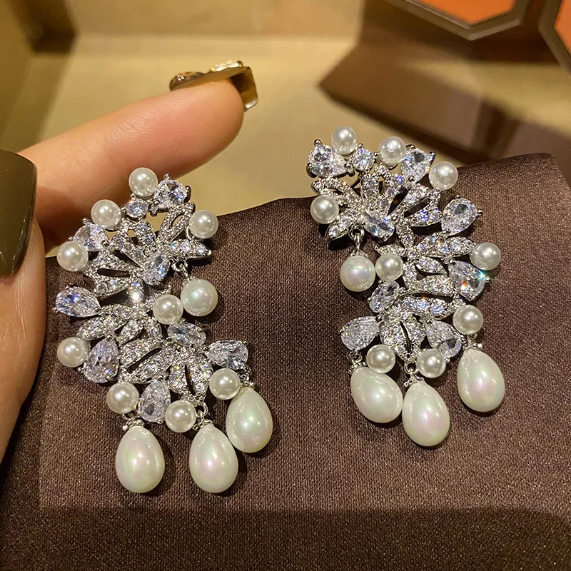 

Роскошные серьги-подвески из серебра 925 пробы с пресноводным жемчугом