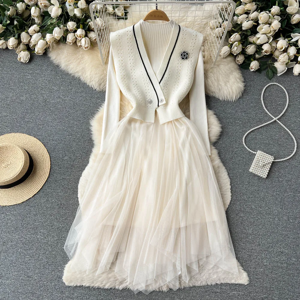 

Autumn and Winter Small Fragrant Wind Celebrity Knitted Stitching Mesh Dress + Short V-neck Vest Two-piece Set