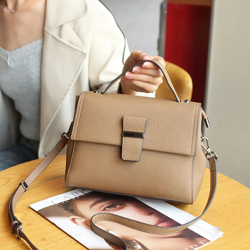 

2023 new leather women's baotou leather shoulder bag temperament Joker portable slung small bag.