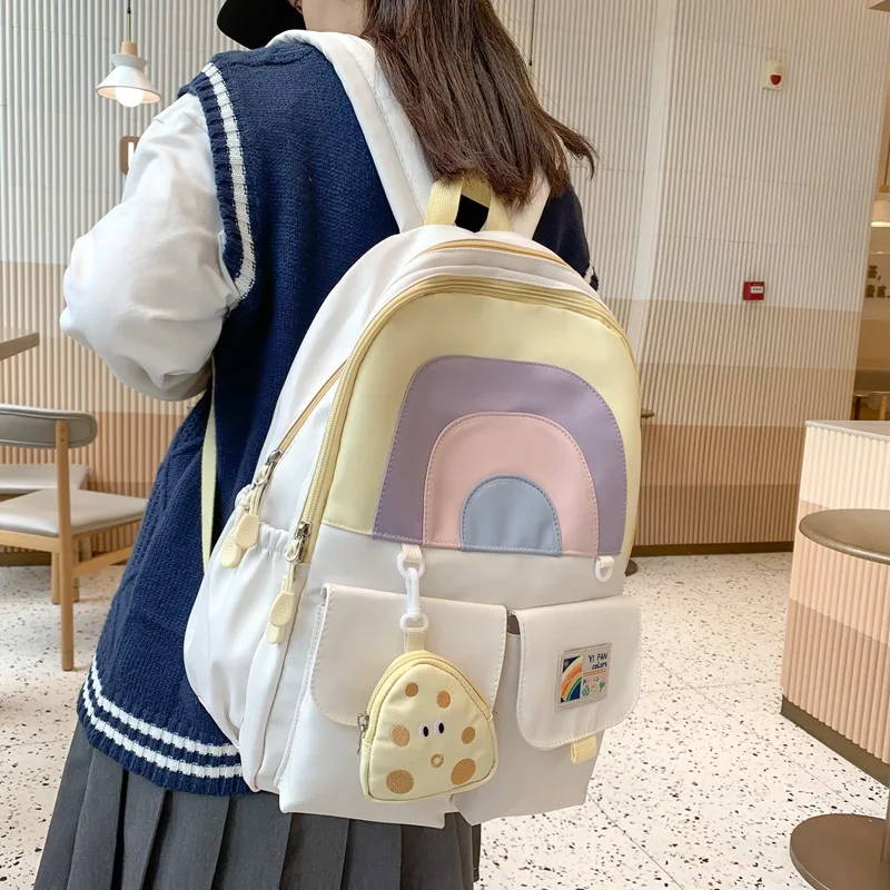 

Qyahlybz cute school bags female primary school students simple large capacity cute rainbow backpack ins students shoulder bag