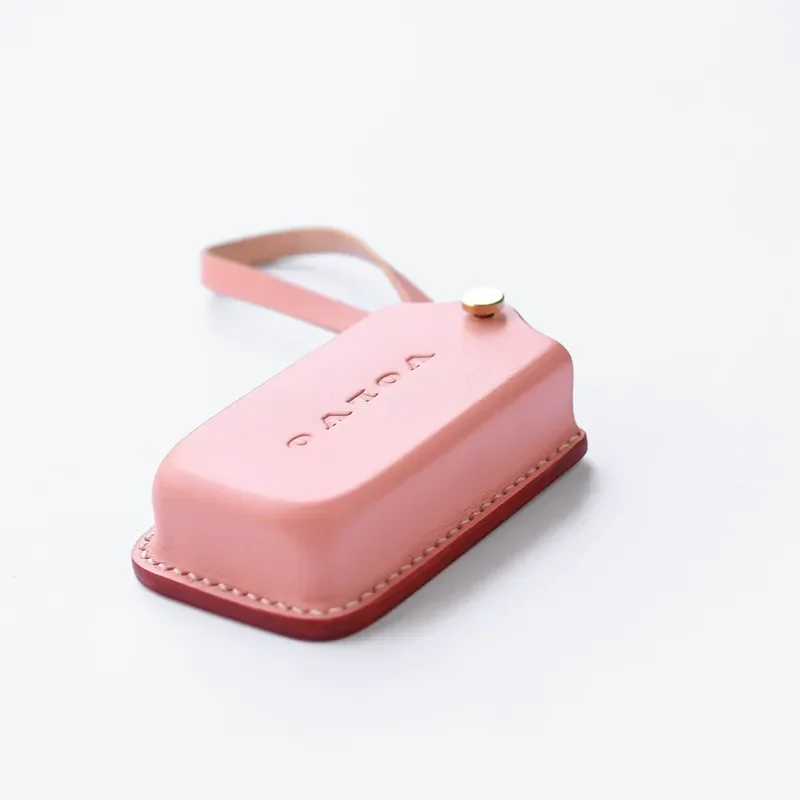 Фото Кожаный чехол для ключей Volvo EX30, индивидуальный 3D защитный чехол для мужчин и женщин, высококачественный чехол для ключей, простой и персонализированный. №2