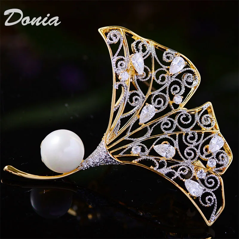 

Donia jewelry European and American fashion brooch plating two-color gold accessories leaf brooch fashion atmosphere leaf brooch