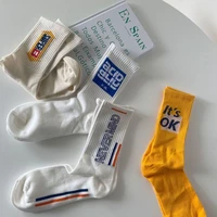 english alphabet womens socks sports leisure medium high tube korean mens white cotton socks trendy hip hop street funny socks