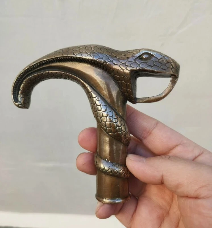 

Antique Victorian Walking Stick with Bronze Gun Head Holding snake