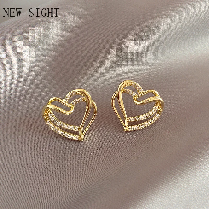 

Ins Hot Sale Crystal Pierced Heart Stud Earrings for Women New Fashion Brand Jewelry Gift Simple Style Earrings