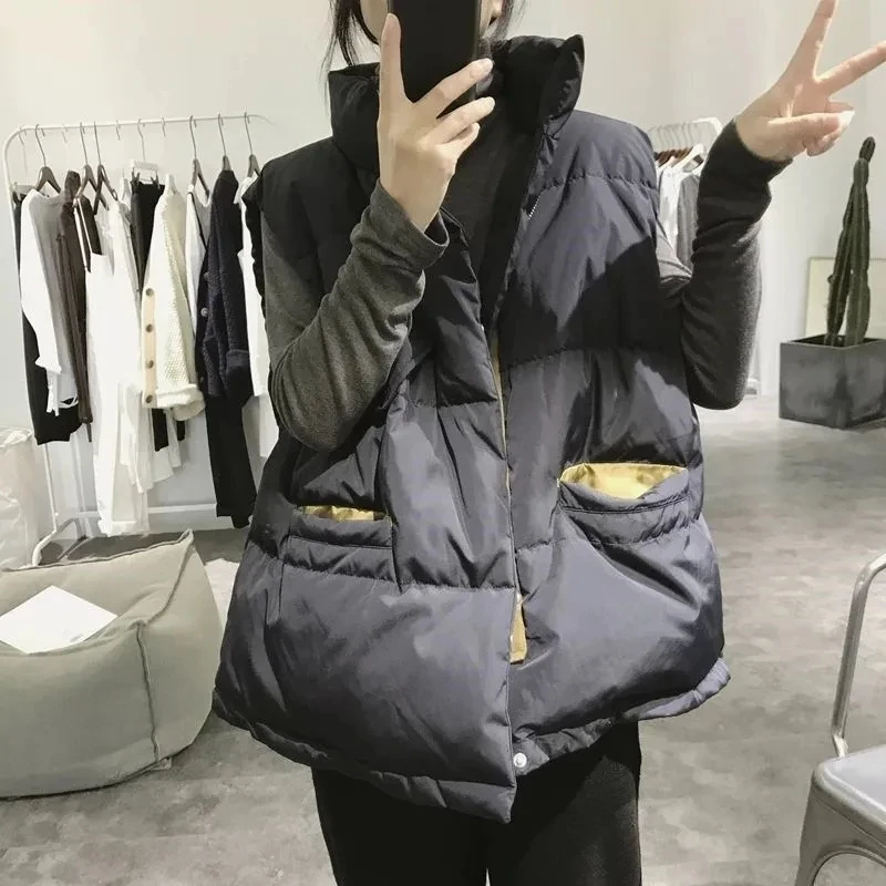 Куртка женская осенне-зимняя черная теплая без рукавов