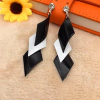 black and white paint leaves diamond curved triangle hollowed out metal earrings popular earrings