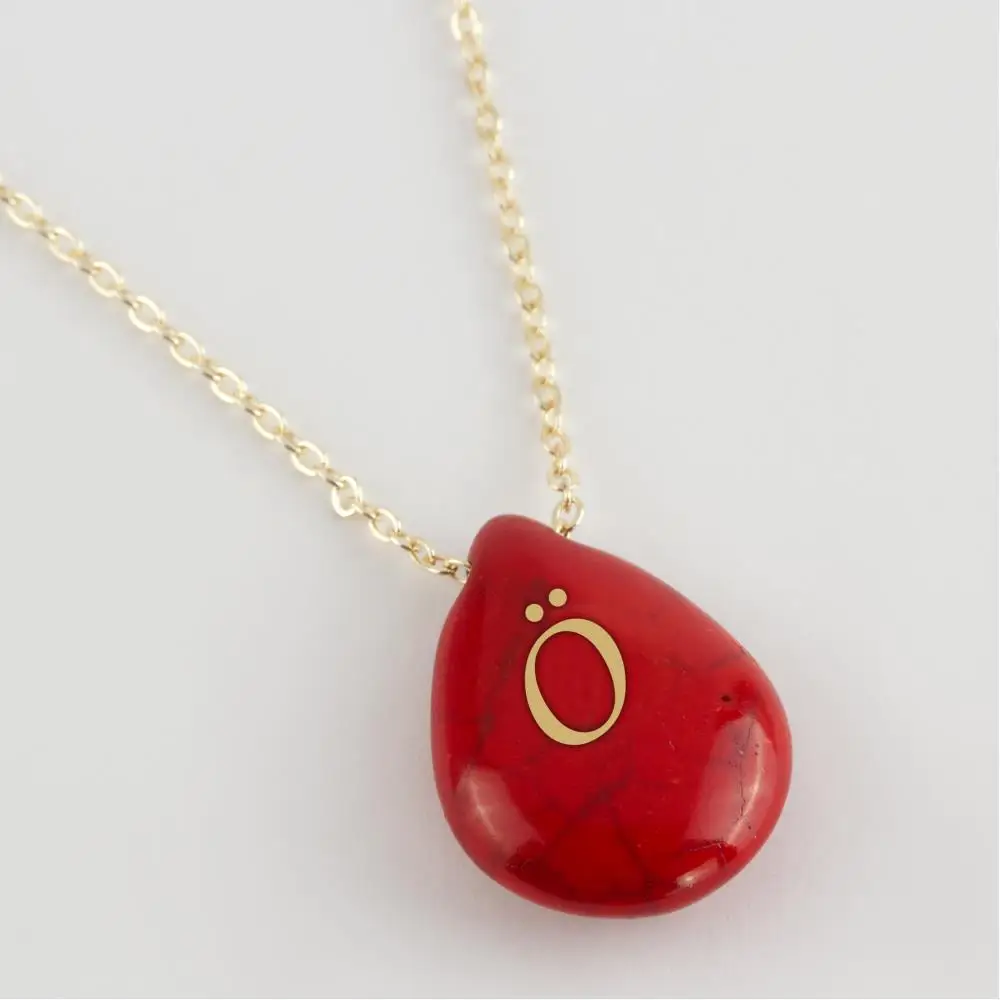 

Turquoise (red color) letter necklace