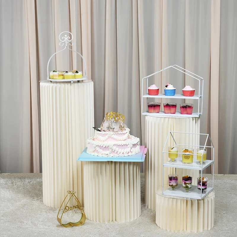 

Wedding Racks Birthday Events Party Decoration Origami Roman Cylindrical Dessert Table Racks Wedding Mall Road Guide Ornaments