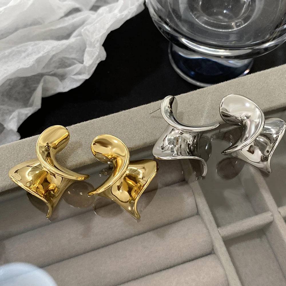 Женские серьги-гвоздики с абстрактными геометрическими фигурами