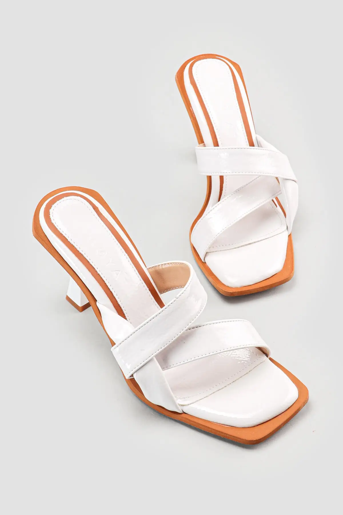 

Women White Cross Detailed Heels Slippers