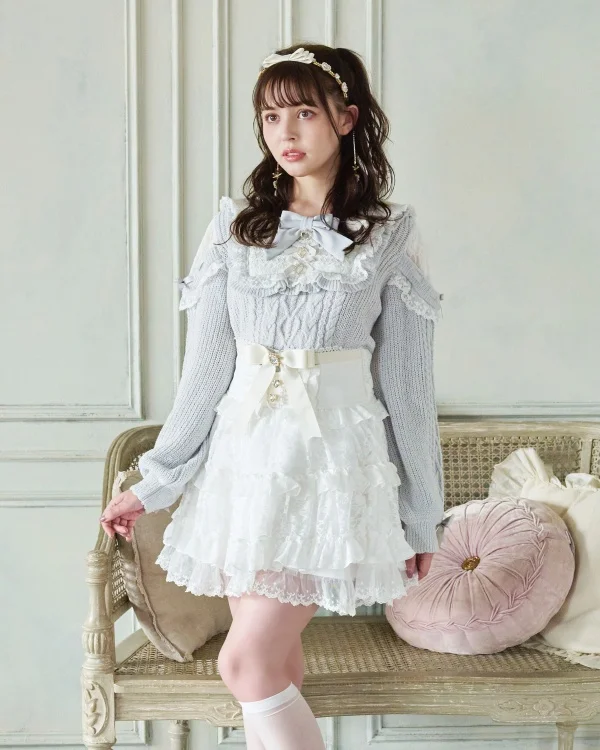 Женский трикотажный свитер с рюшами и длинным рукавом на осень/зиму