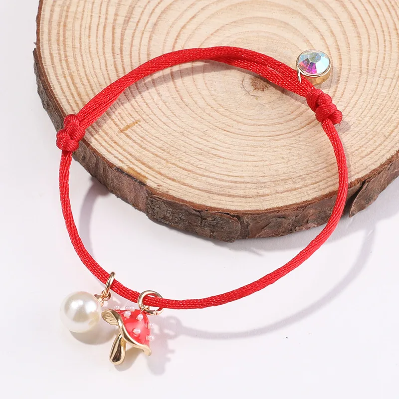 

Makersland Mushroom red rope braided bracelet female ins niche design sense handmade braided rope retractable personality