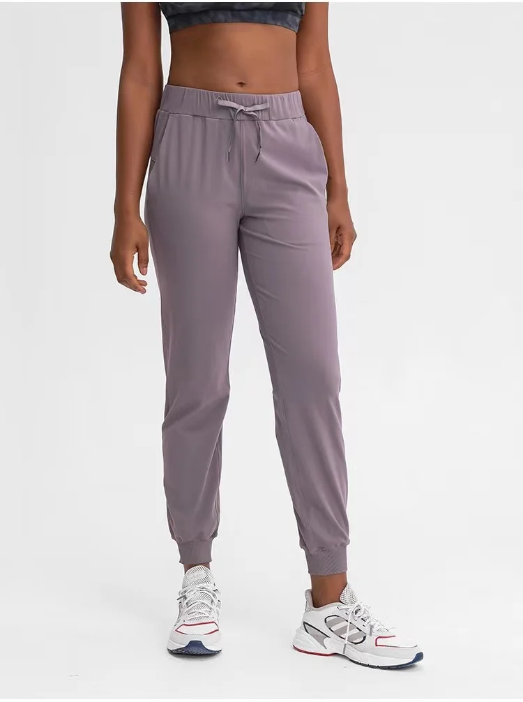 With Logo Women Fitness Jogger Leggings with two side pockets  Stretch fabrics Loose Fit Sport Active Skinny Ankle-Length Pants