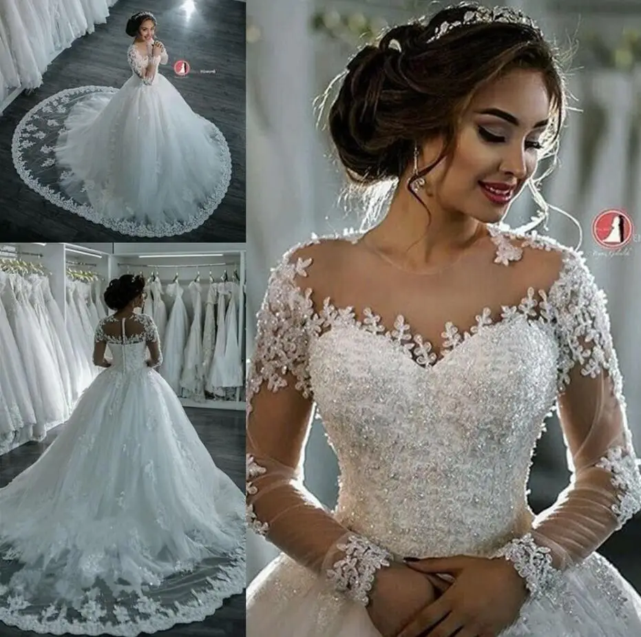 

Dubai Elegant Long Sleeves A-line Wedding Dresses Sheer Crew Neck Lace Appliques Beaded Vestios De Novia Bridal Gowns