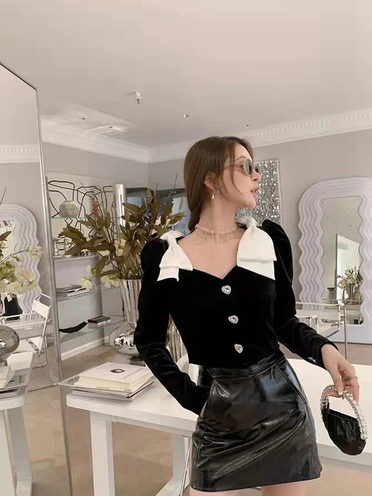 

Весенняя новая легкая роскошная бархатная рубашка с длинными рукавами и бантом, милая и нежная рубашка с квадратным воротником и пуговицам...