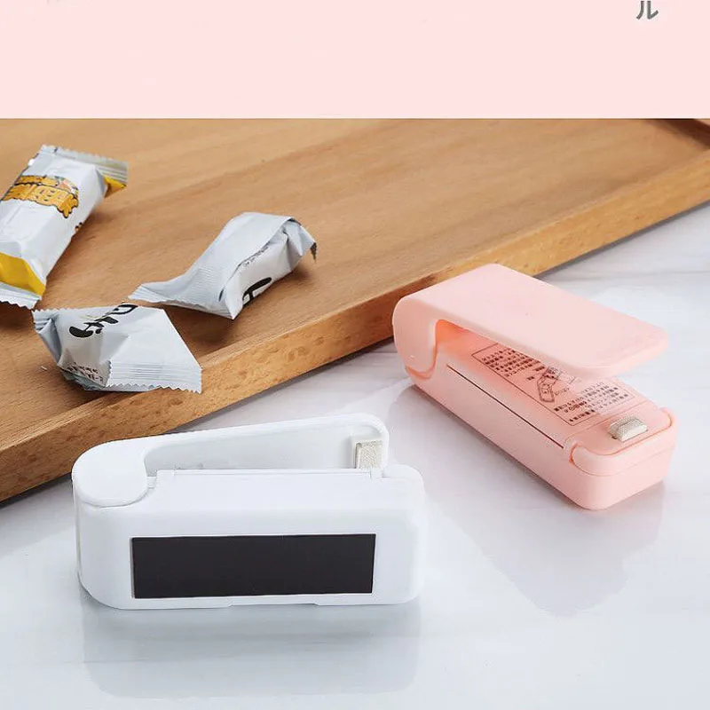 

Portable Bag Heat Sealer Plastic Package Storage Bag Clip Mini Sealing Machine Handy Sticker Seal for Food Snack Kitchen Gadgets