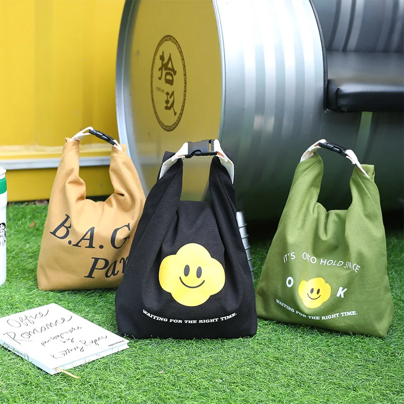 

Convenient bento bag Korean fashion girl simple smiling face canvas insulation lunch box picnic bag storage bag