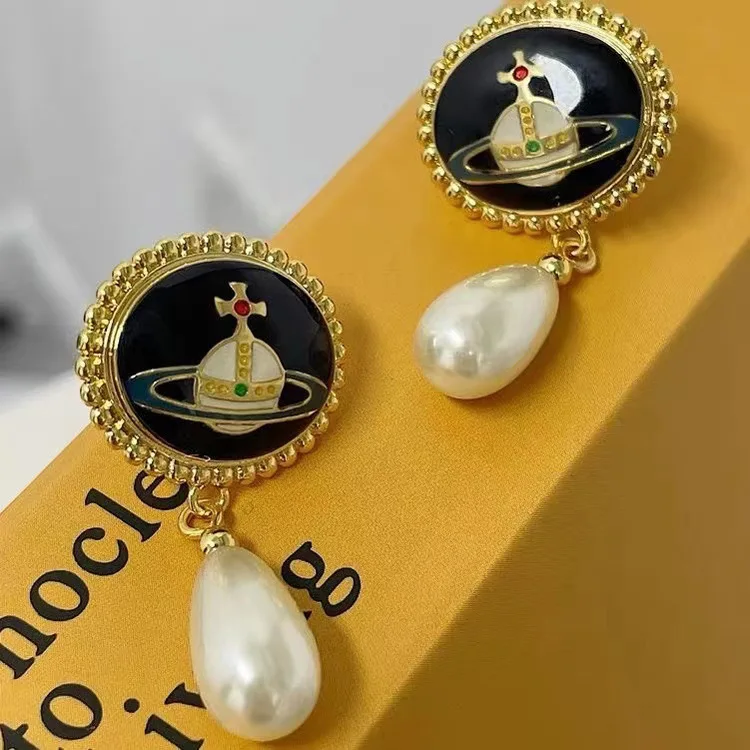 

The Queen Mother Slightly Installed Saturn Enamel Drop Pearl Earrings Retro Palace Style High-grade Earrings