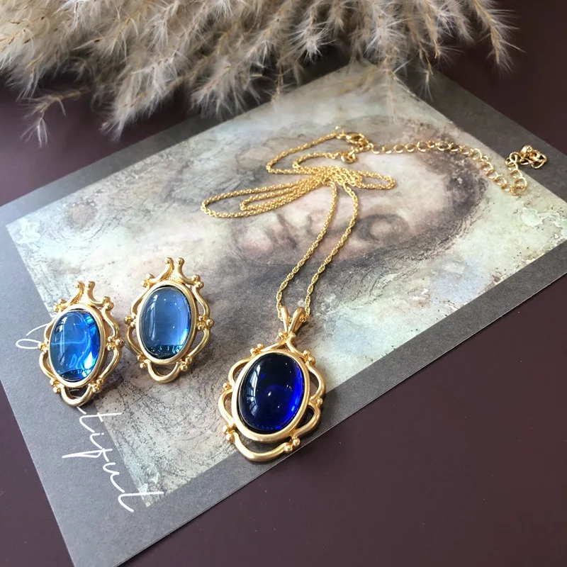 

Medieval Sapphire Blue Ocean Large Glass Carving Retro Light Luxury Exquisite Silver Needle Earrings Necklace Pendant Set